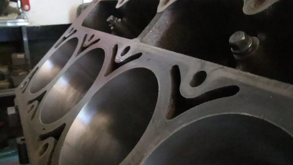 Close-up of the cylinder bores of a V8 block in the machine shop