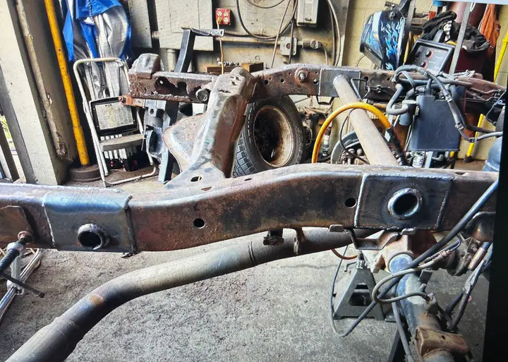Frame rails with new steel plates welded over the rotted sections